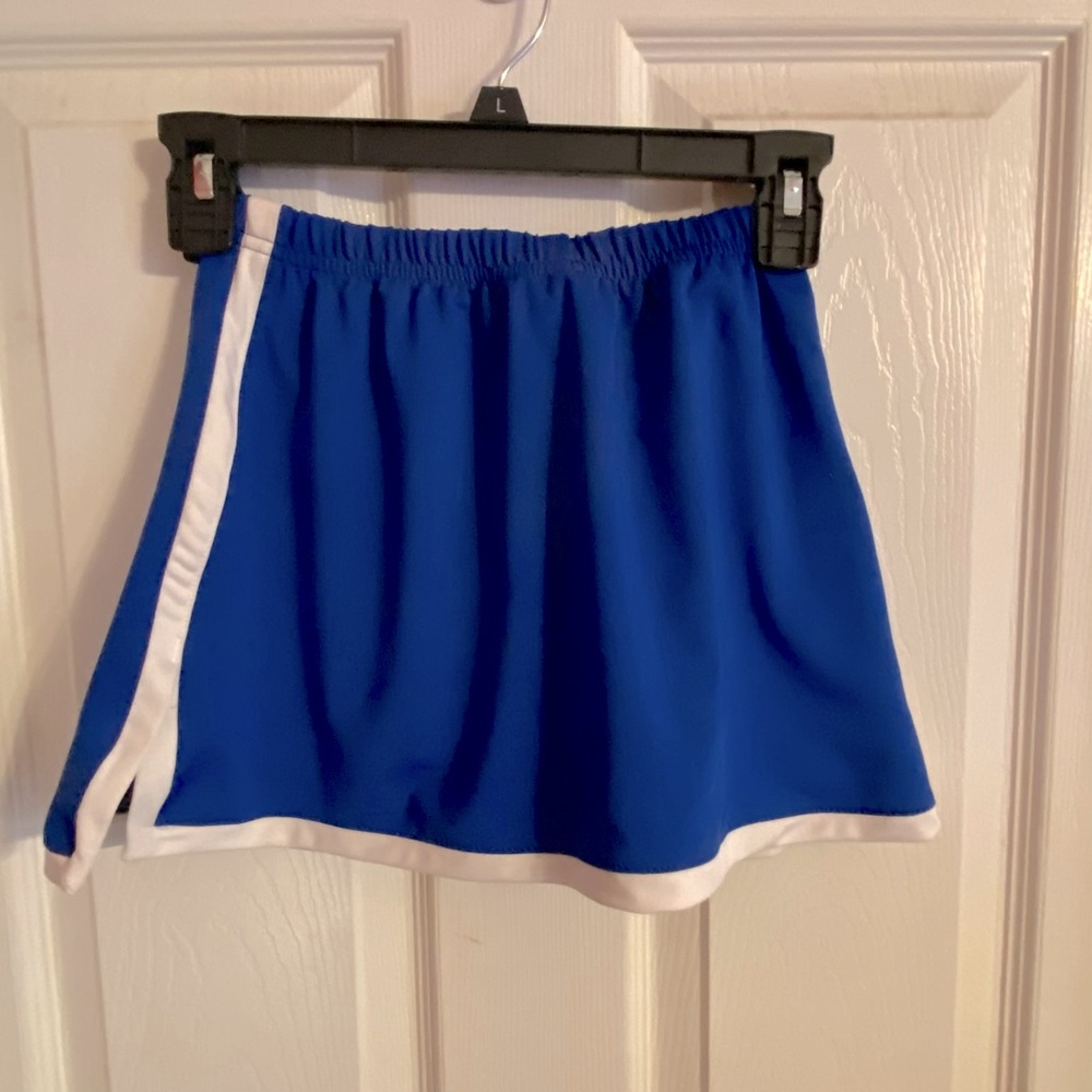 Augusta Sportswear Girls large tennis skirt/shorts.  NWOT. Never worn.